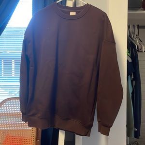 Brown crewneck.